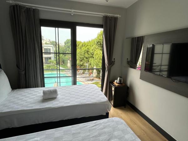 Malta Hotel Bodrum : photo 4 de la chambre chambre lits jumeaux supérieure - vue sur jardin