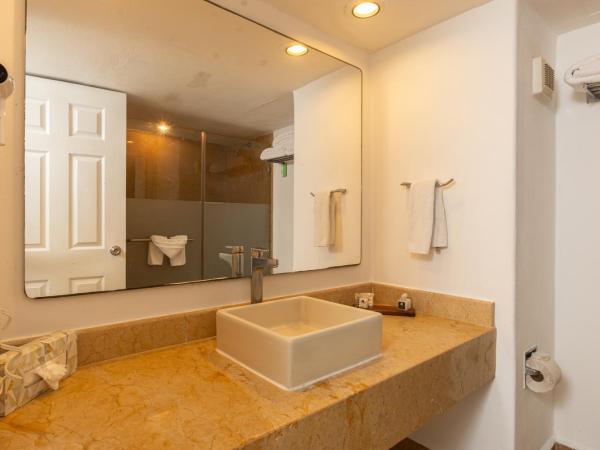 Tesoro Ixtapa Beach Resort : photo 4 de la chambre chambre double deluxe - vue sur jardin