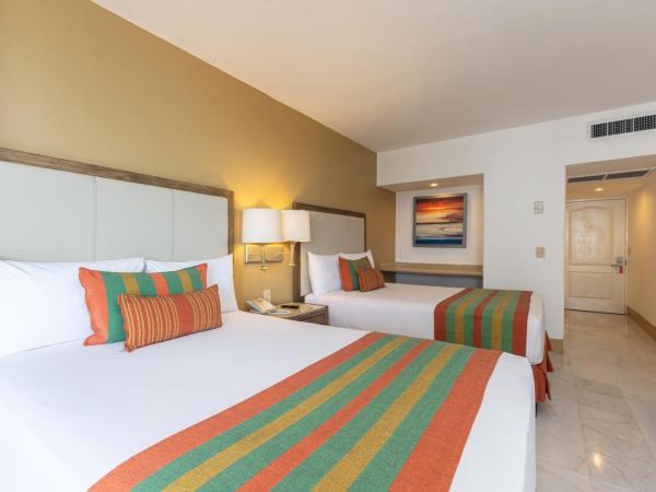 Tesoro Ixtapa Beach Resort : photo 3 de la chambre chambre double/lit king-size de luxe avec vue partielle océan