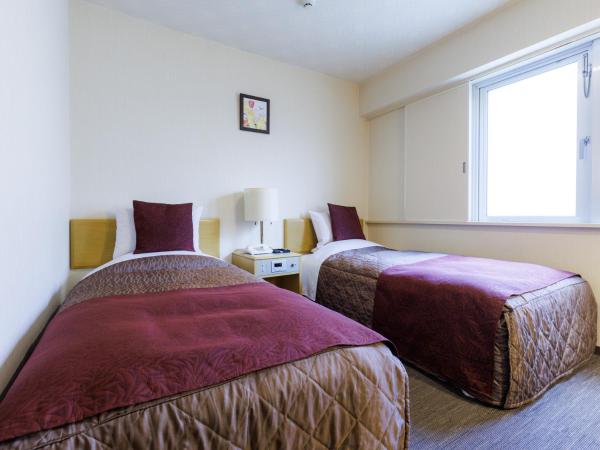 Tabist Hokkaido Daiichi Hotel Sapporo : photo 1 de la chambre chambre lits jumeaux standard