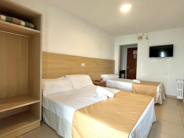 Hostal Mozaik Playa : photo 3 de la chambre chambre triple deluxe - vue sur mer