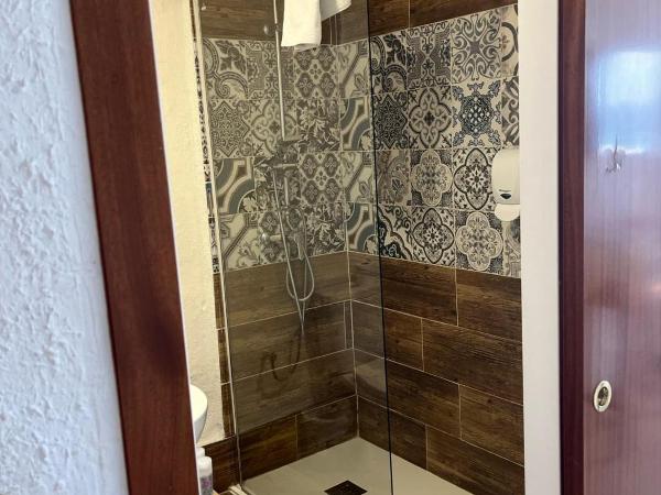 Hostal Mozaik Playa : photo 4 de la chambre chambre triple deluxe - vue sur mer