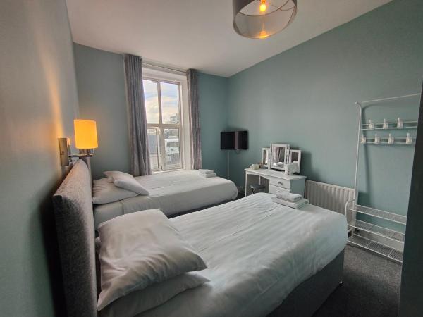 Station View Tavern : photo 5 de la chambre chambre lits jumeaux