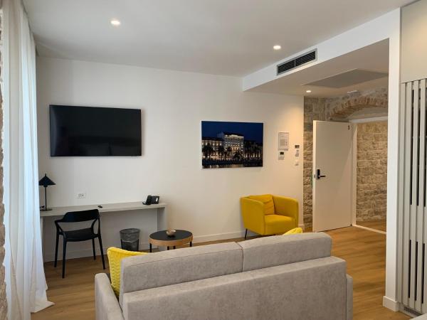 Priuli Heritage Suites : photo 10 de la chambre suite deluxe avec lit king-size