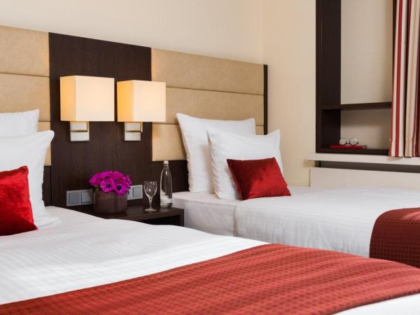 Leonardo Hotel Munich Arabellapark : photo 5 de la chambre chambre lits jumeaux confort
