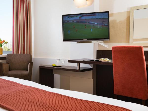 Leonardo Hotel Munich Arabellapark : photo 9 de la chambre chambre deluxe double ou lits jumeaux
