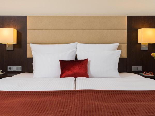 Leonardo Hotel Munich Arabellapark : photo 8 de la chambre chambre deluxe double ou lits jumeaux