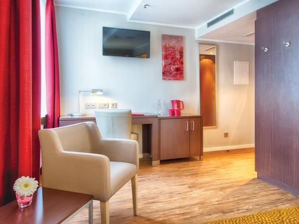 Leonardo Hotel München City Center : photo 6 de la chambre chambre double ou lits jumeaux confort 