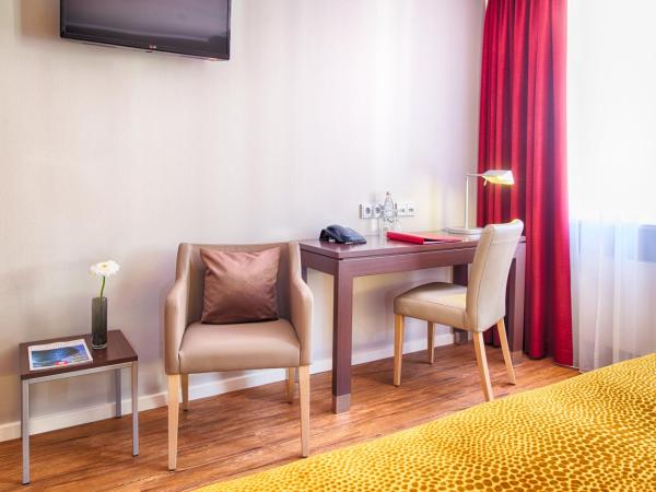 Leonardo Hotel München City Center : photo 6 de la chambre chambre deluxe double ou lits jumeaux