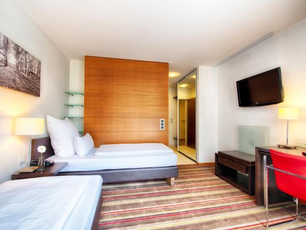Leonardo Hotel Muenchen City West : photo 8 de la chambre chambre double ou lits jumeaux supérieure
