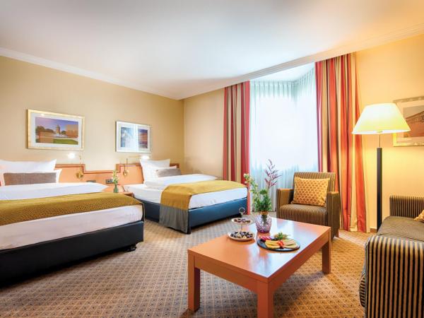 Leonardo Hotel Mannheim City Center : photo 4 de la chambre chambre quadruple exécutive
