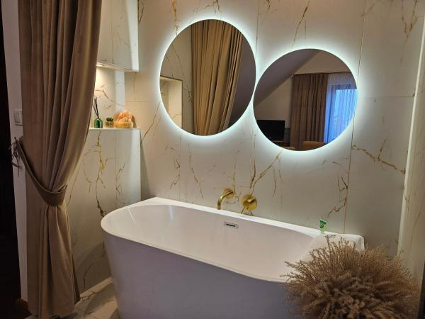 Dom Potok : photo 8 de la chambre chambre double deluxe avec baignoire