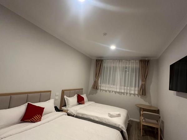 AWA Hotel : photo 3 de la chambre chambre double supérieure avec deux lits doubles