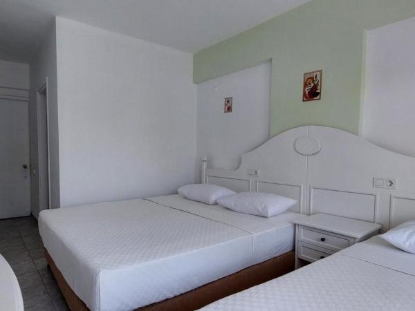 UK Hotel Kiriş : photo 1 de la chambre chambre triple standard