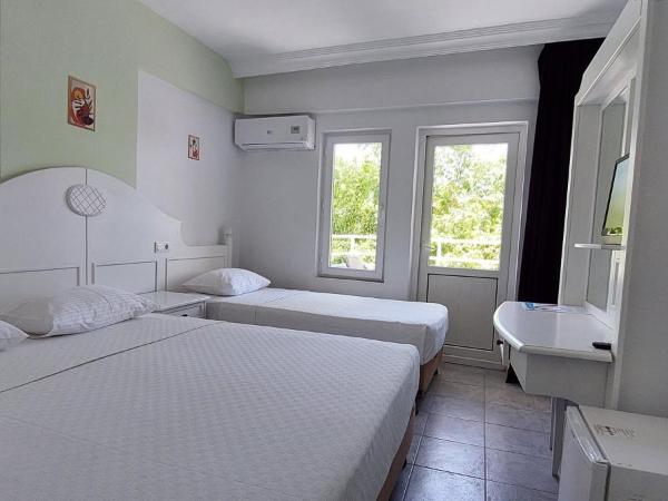 UK Hotel Kiriş : photo 3 de la chambre chambre triple standard