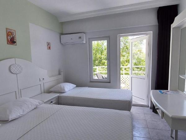 UK Hotel Kiriş : photo 2 de la chambre chambre triple standard