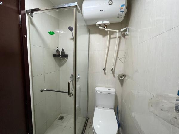 广州朴宿漫享公寓(琶洲国际会展中心店) : photo 9 de la chambre chambre lit queen-size