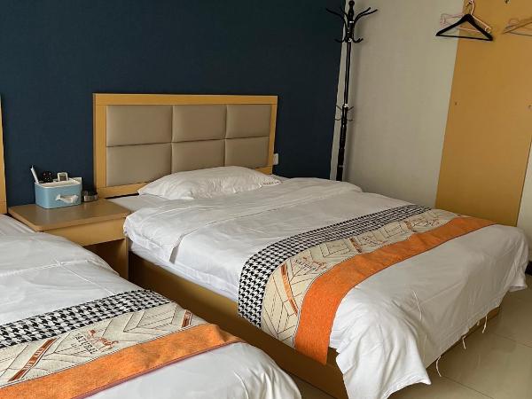 广州朴宿漫享公寓(琶洲国际会展中心店) : photo 6 de la chambre chambre lits jumeaux avec douche