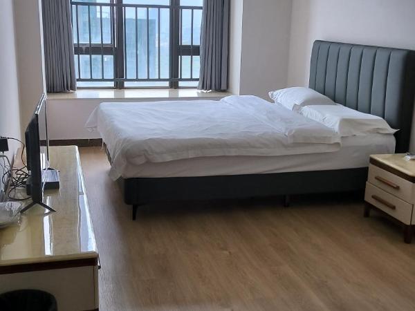 广州朴宿漫享公寓(琶洲国际会展中心店) : photo 1 de la chambre chambre triple avec salle de bains
