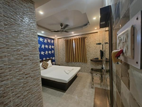 Golden Heaven Hotel : photo 4 de la chambre chambre double deluxe (2 adultes + 1 enfant)