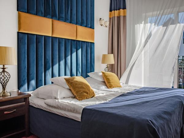 Prawdzic Family Resort & Wellness : photo 1 de la chambre chambre quadruple confort