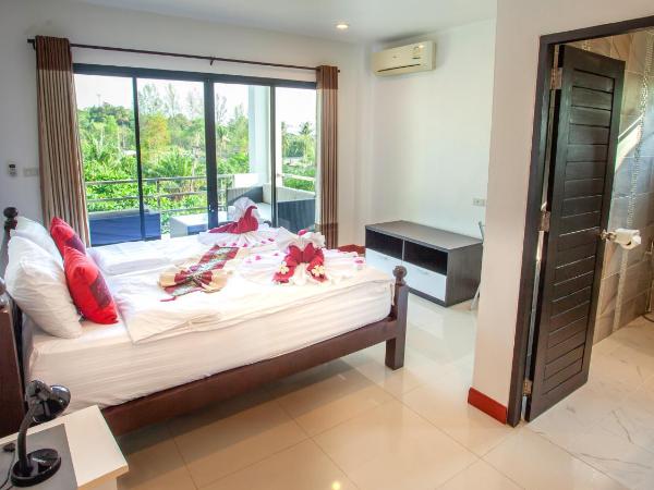 White Flower Lanta : photo 5 de la chambre appartement - vue sur piscine 