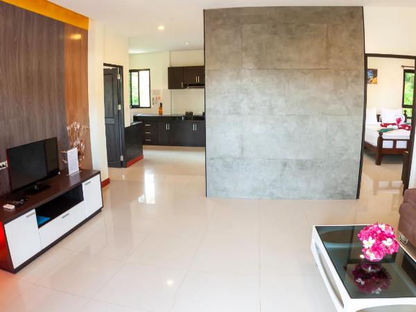 White Flower Lanta : photo 2 de la chambre appartement - vue sur piscine 