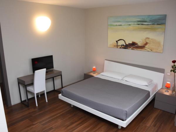 Residence Nazionale Matera : photo 8 de la chambre suite lit king-size