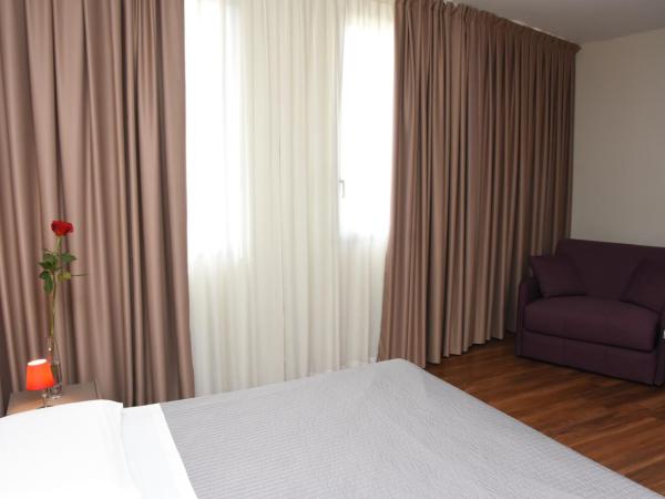 Residence Nazionale Matera : photo 7 de la chambre suite lit king-size