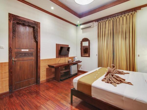 Escotel Keraton By Reccoma : photo 4 de la chambre chambre deluxe