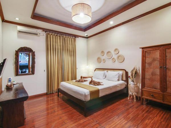 Escotel Keraton By Reccoma : photo 2 de la chambre chambre deluxe