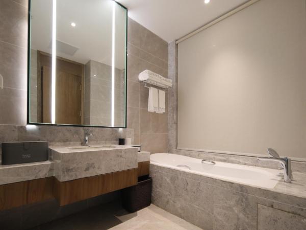 Ramada by Wyndham Wuhan Wangjiawan : photo 2 de la chambre executive king room -  chinese citizens only 