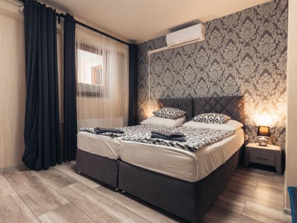 Végvári Hotel Eger : photo 1 de la chambre chambre double avec salle de bains privative extérieure