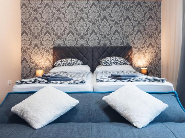 Végvári Hotel Eger : photo 1 de la chambre chambre lits jumeaux deluxe