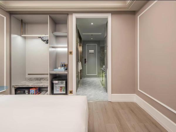 Mercure Wuxi Taihu Scenic Area Jiangnan University : photo 1 de la chambre chambre lit king-size deluxe