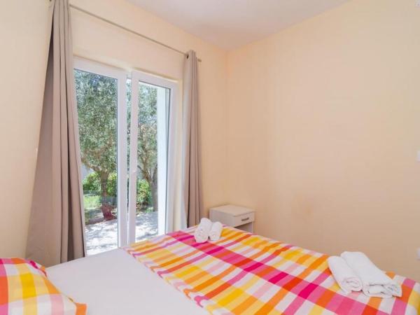 Apartments & Rooms Tapera : photo 5 de la chambre appartement 1 chambre confort avec terrasse - vue sur jardin