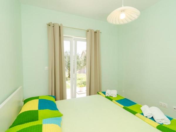 Apartments & Rooms Tapera : photo 3 de la chambre appartement standard 1 chambre avec terrasse - vue sur jardin