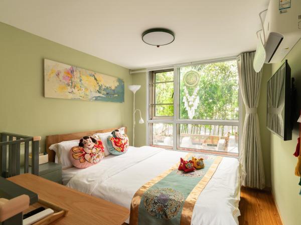 Rong Hotel - Beijing Nanluoguxiang Branch : photo 1 de la chambre chambre quadruple en duplex