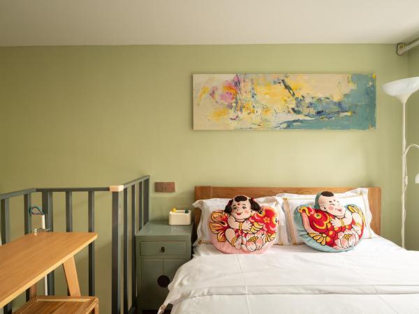 Rong Hotel - Beijing Nanluoguxiang Branch : photo 6 de la chambre chambre quadruple en duplex