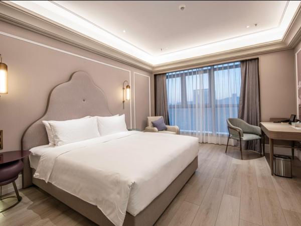 Mercure Wuxi Taihu Scenic Area Jiangnan University : photo 1 de la chambre chambre lit king-size supérieure