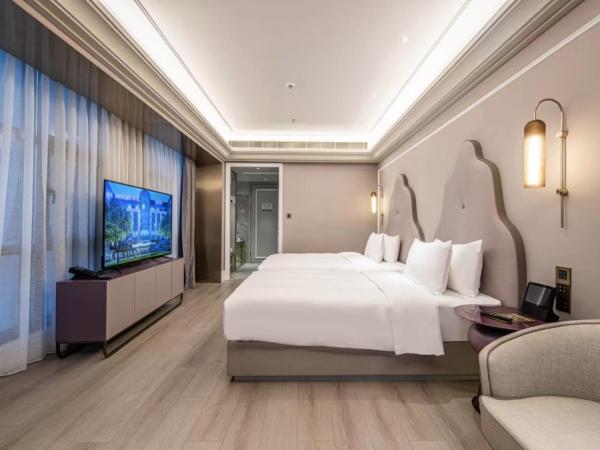 Mercure Wuxi Taihu Scenic Area Jiangnan University : photo 1 de la chambre chambre lits jumeaux privilège