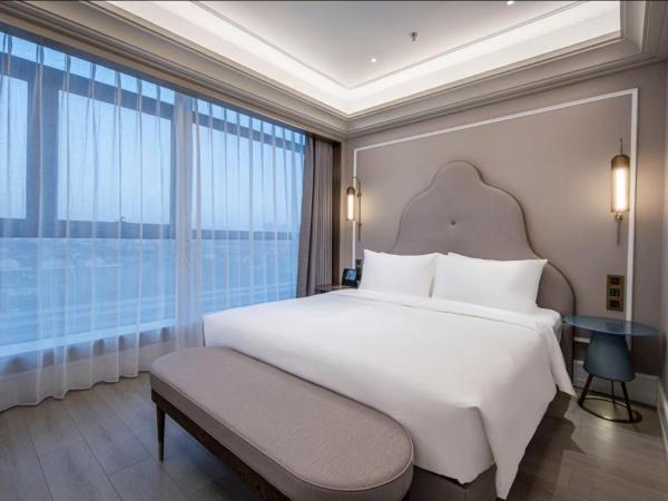 Mercure Wuxi Taihu Scenic Area Jiangnan University : photo 2 de la chambre suite lit king-size privilège