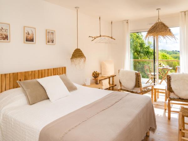 Le Vallon de Léhon : photo 4 de la chambre chambre double - vue sur jardin