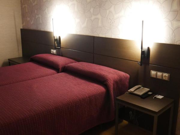 Hostal 4C Cuatro Caminos : photo 4 de la chambre chambre lits jumeaux supérieure