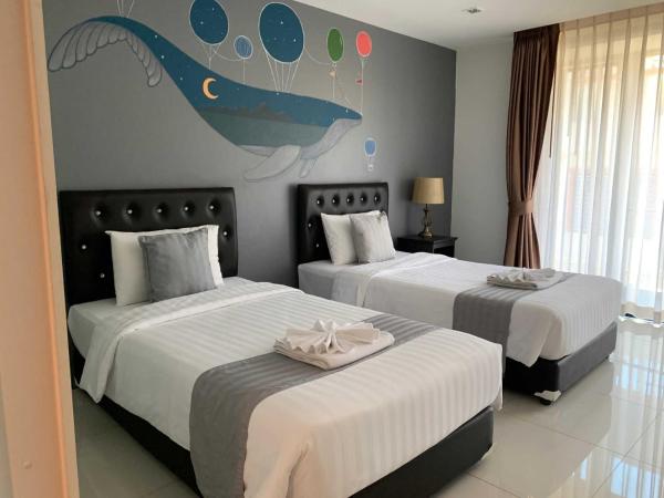 Panwa Beach Side Beachfront : photo 6 de la chambre chambre lits jumeaux deluxe