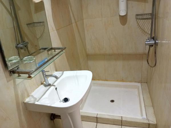 Urbanview Hotel Syariah Hapsari YIA : photo 6 de la chambre chambre double deluxe