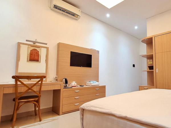 Urbanview Hotel Syariah Hapsari YIA : photo 1 de la chambre suite