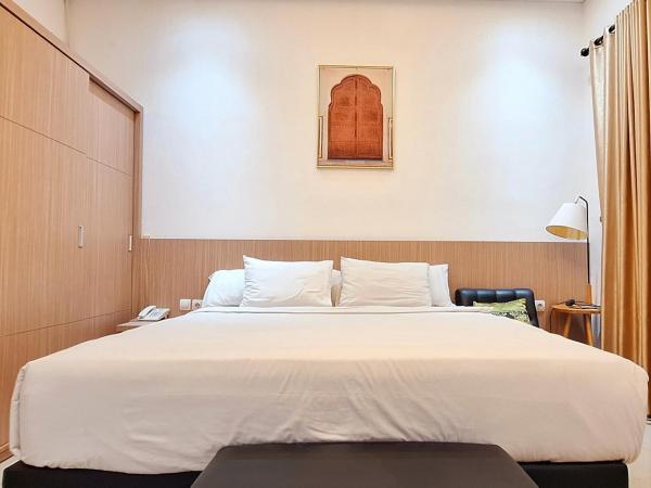 Urbanview Hotel Syariah Hapsari YIA : photo 2 de la chambre suite