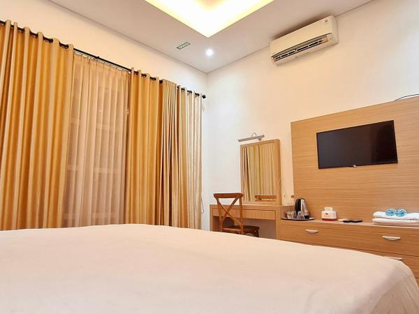Urbanview Hotel Syariah Hapsari YIA : photo 4 de la chambre suite