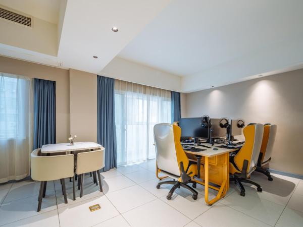 网鱼电竞酒店(竹山路地铁站店) : photo 2 de la chambre suite